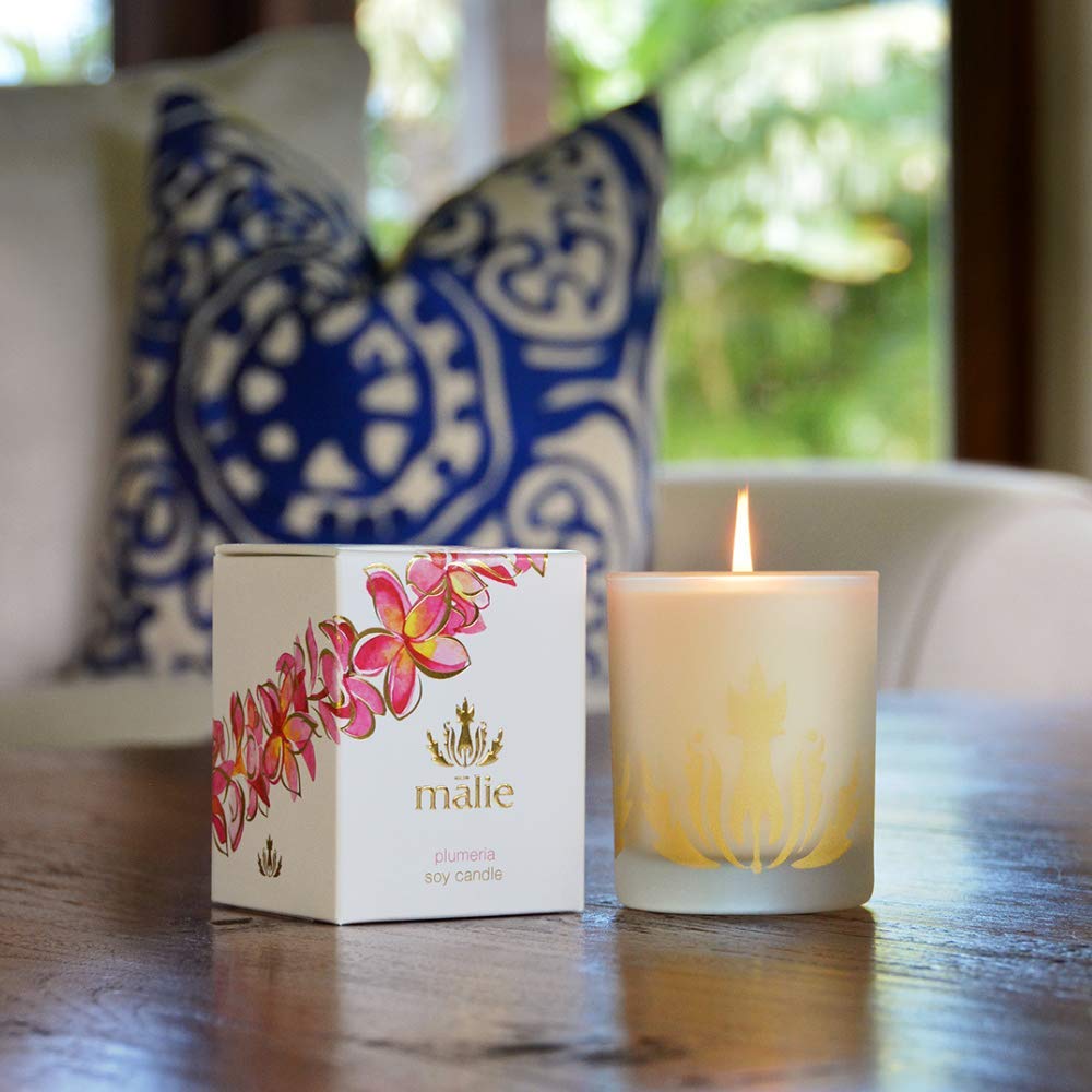 Malie's Plumeria 8 Oz Scented Soy Candle with clean-burning waxes & Hawaiian Aromatherapy, relax and immerse yourself in the serene air of the Hawaiian tropics.