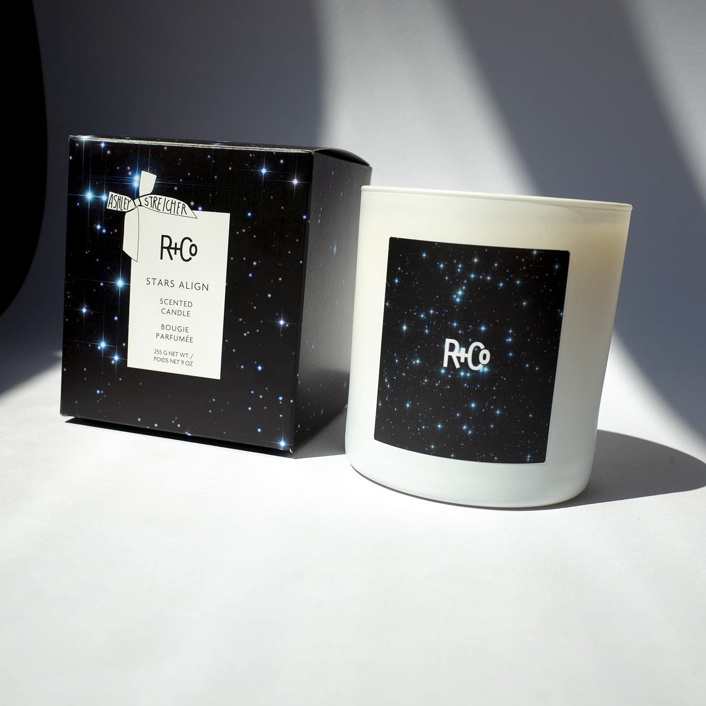 R+Co Stars Align Candle | Essence of Palo Santo + White Cedar Wood + Smoky Tobacco | Vegan + Cruelty-Free | 0.5 lb.