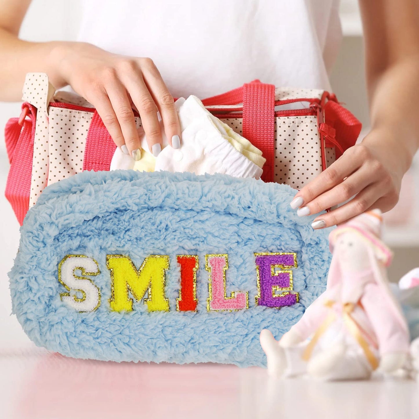 WOLECX Preppy Makeup Bag Cute Fuzzy Chenille Letter Nylon Pouch, Kawaii Plush Small Cosmetic Bag For Purse, Portable Travel Soft Warm Travelling Organizer Bags 12+ (Light Blue Smile)